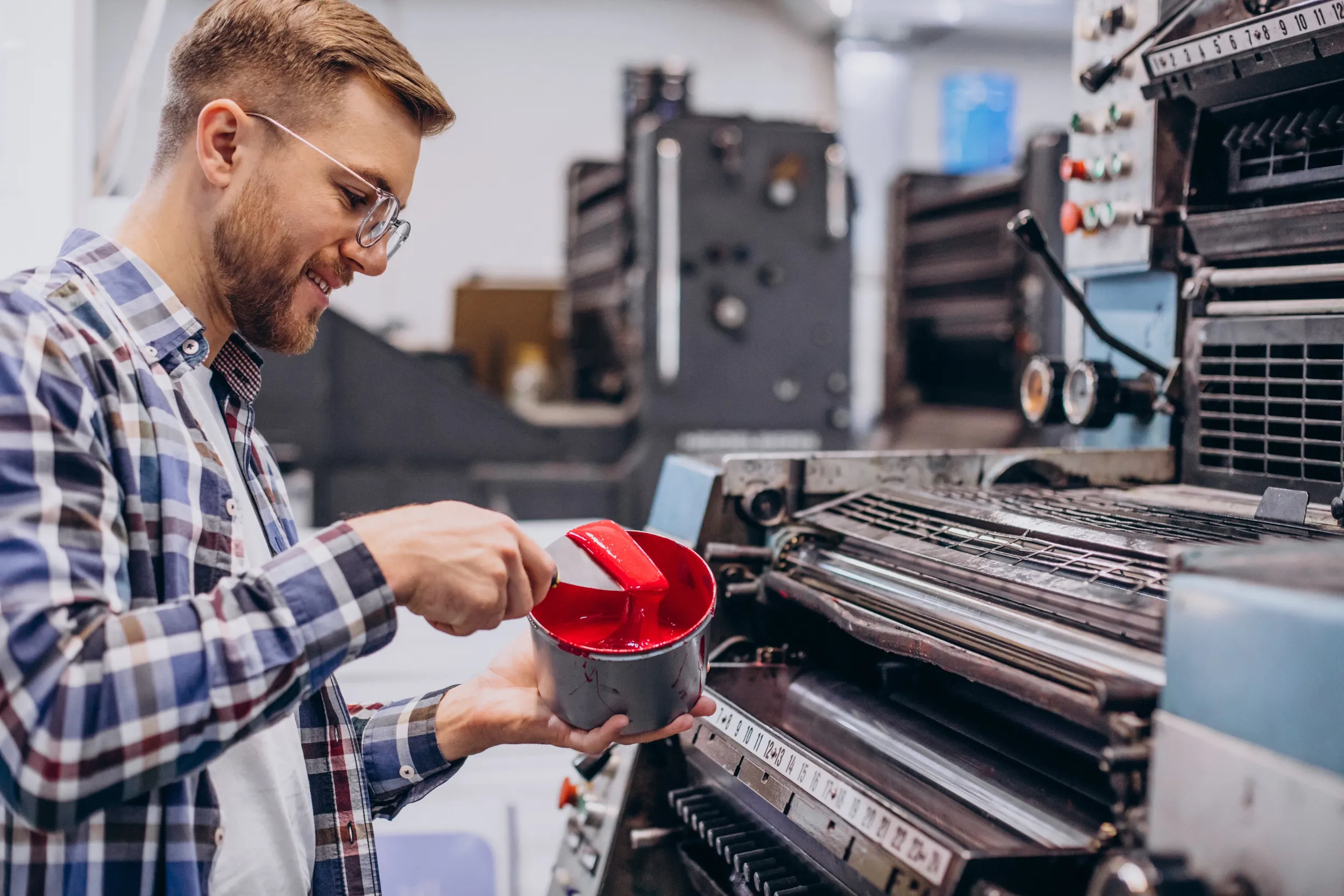 Worker checking print quality